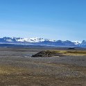 Snow peaked mountains off in the distance